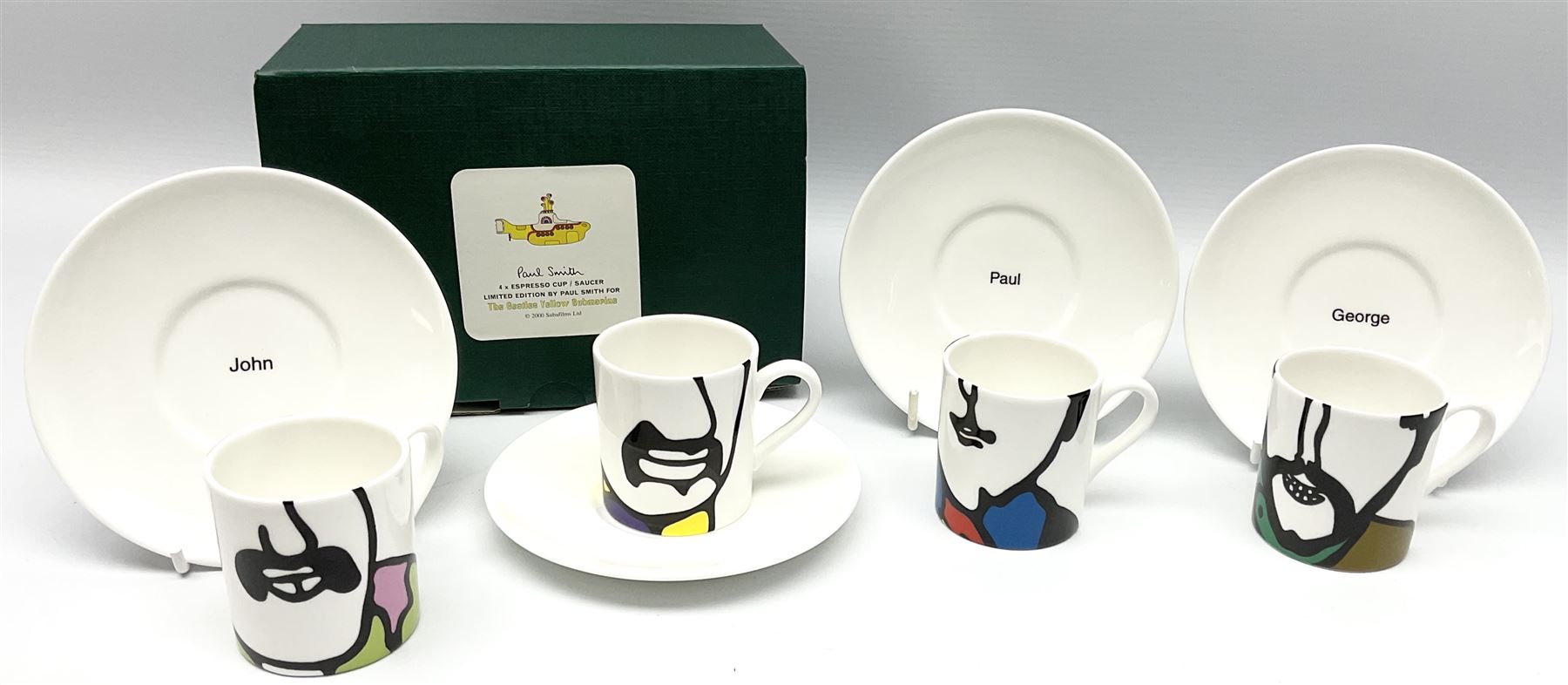 Four limited edition Beatles Yellow Submarine espresso cups and saucers, designed by Paul Smith and made for Thomas Goode, 78/200, in original box