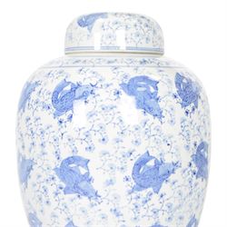 Blue and white ginger jar, decorated in a repetitive pattern of fish swimming amongst dense clusters of aquatic foliage, H40cm