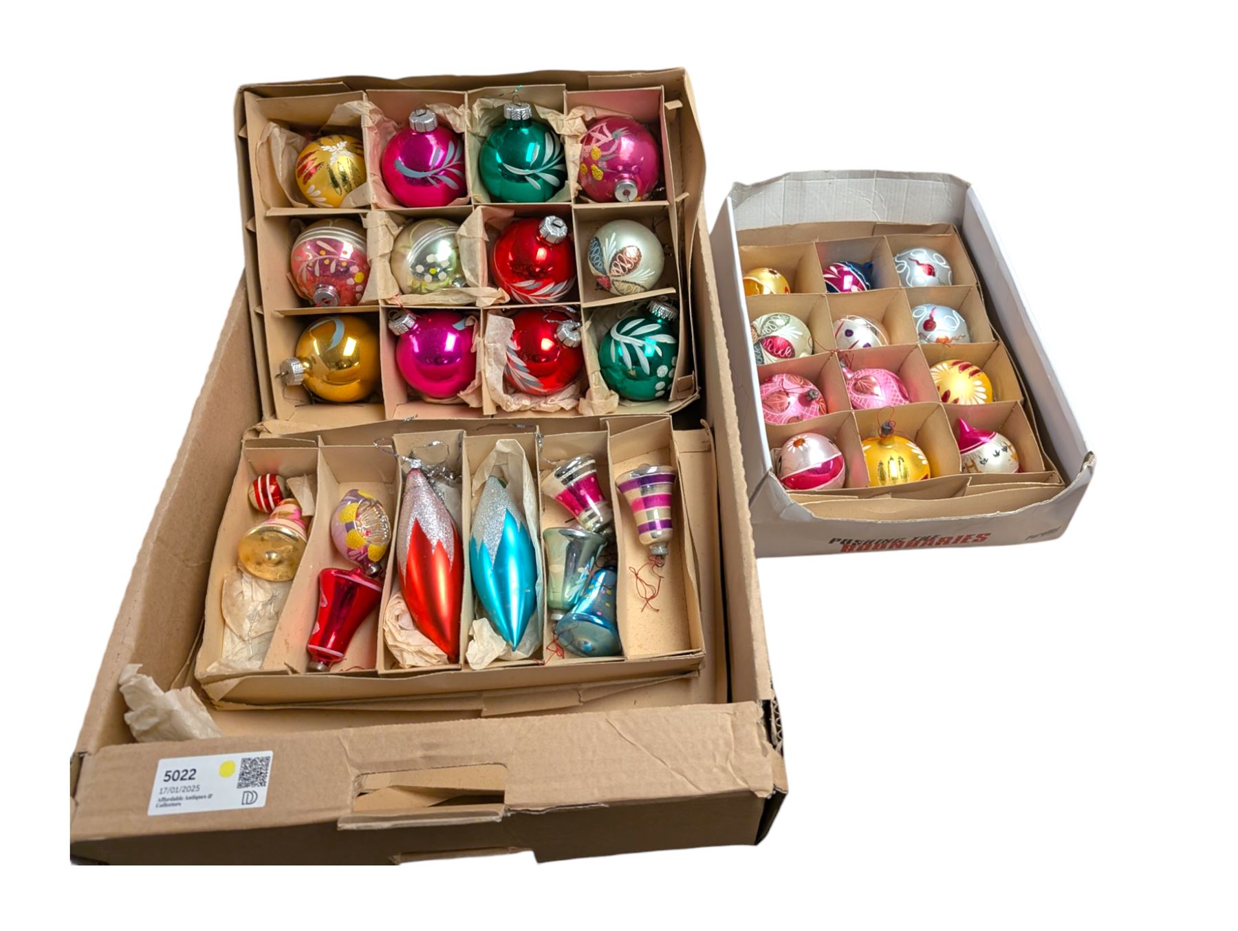 Collection of colourful vintage Christmas decorations, including glass and metal baubles