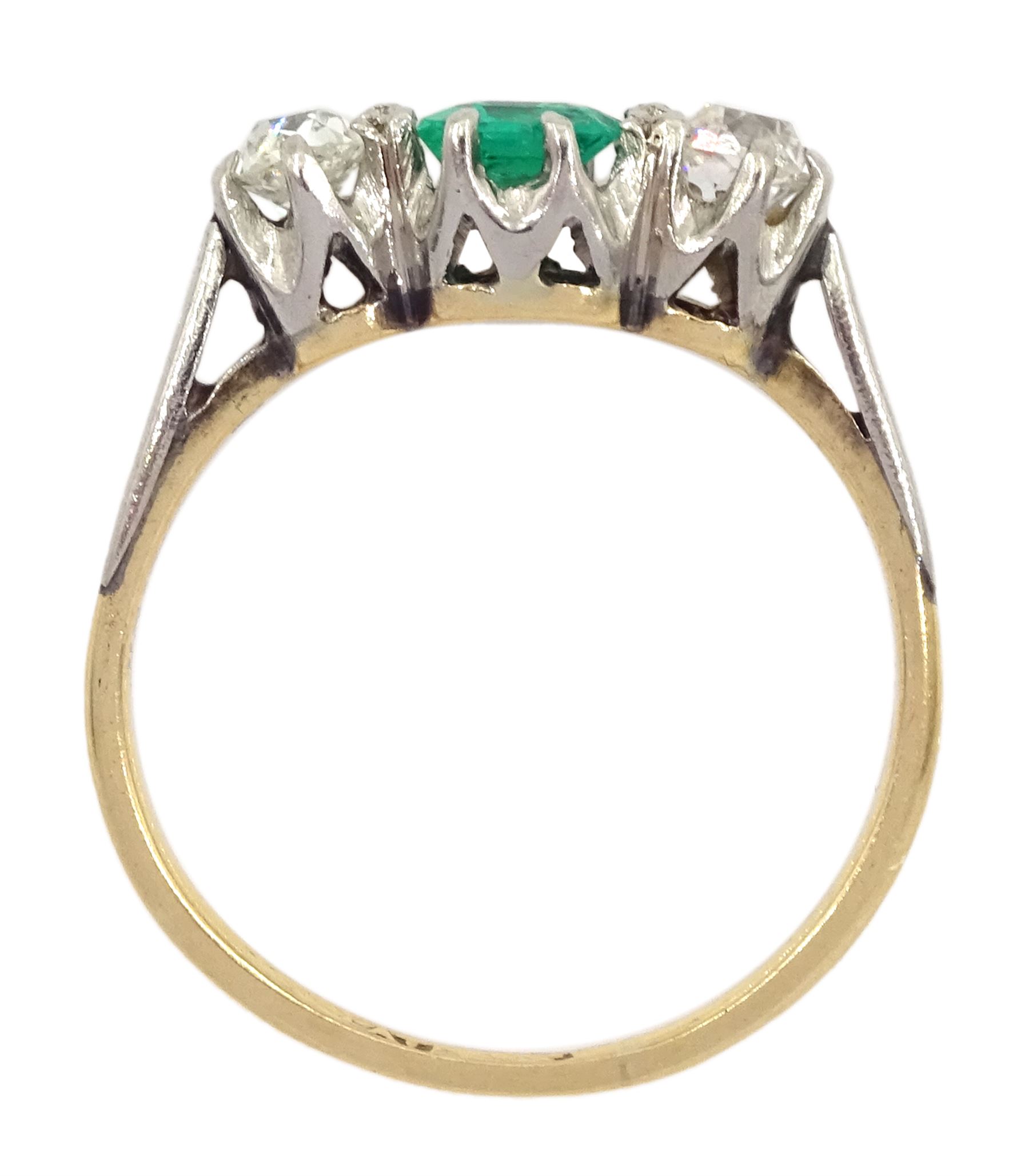 Early 20th century 15ct and palladium three stone emerald and old cut diamond ring, emerald approx 0.35 carat, total diamond weight approx 0.40 carat