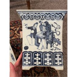 19th century Chinese blue and white planter and stand, each of square slightly tapering and flared form, the planter decorated with figures and precious objects between stylised foliate borders, the stand decorated with landscapes beneath a lipped rim with cell band, planter H28cm D25.5cm, stand H7cm D26cm