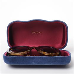 Gucci - pair of oversized round sunglasses, with gradient tinted lenses in a tortoiseshell-effect frame with blue and gold glitter inlay, the temples with interlocking gold-tone GG logo and bee motif, unused with original cloth and hard cases