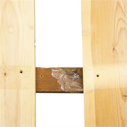 Mid-20th century French walnut small double 4' 2'' bedstead, shaped and moulded headboard with shell and curl acanthus leaf carved pediment with extending flower heads, quarter-matched veneers decorated with applied mouldings and cast gilt metal ribbon tie 