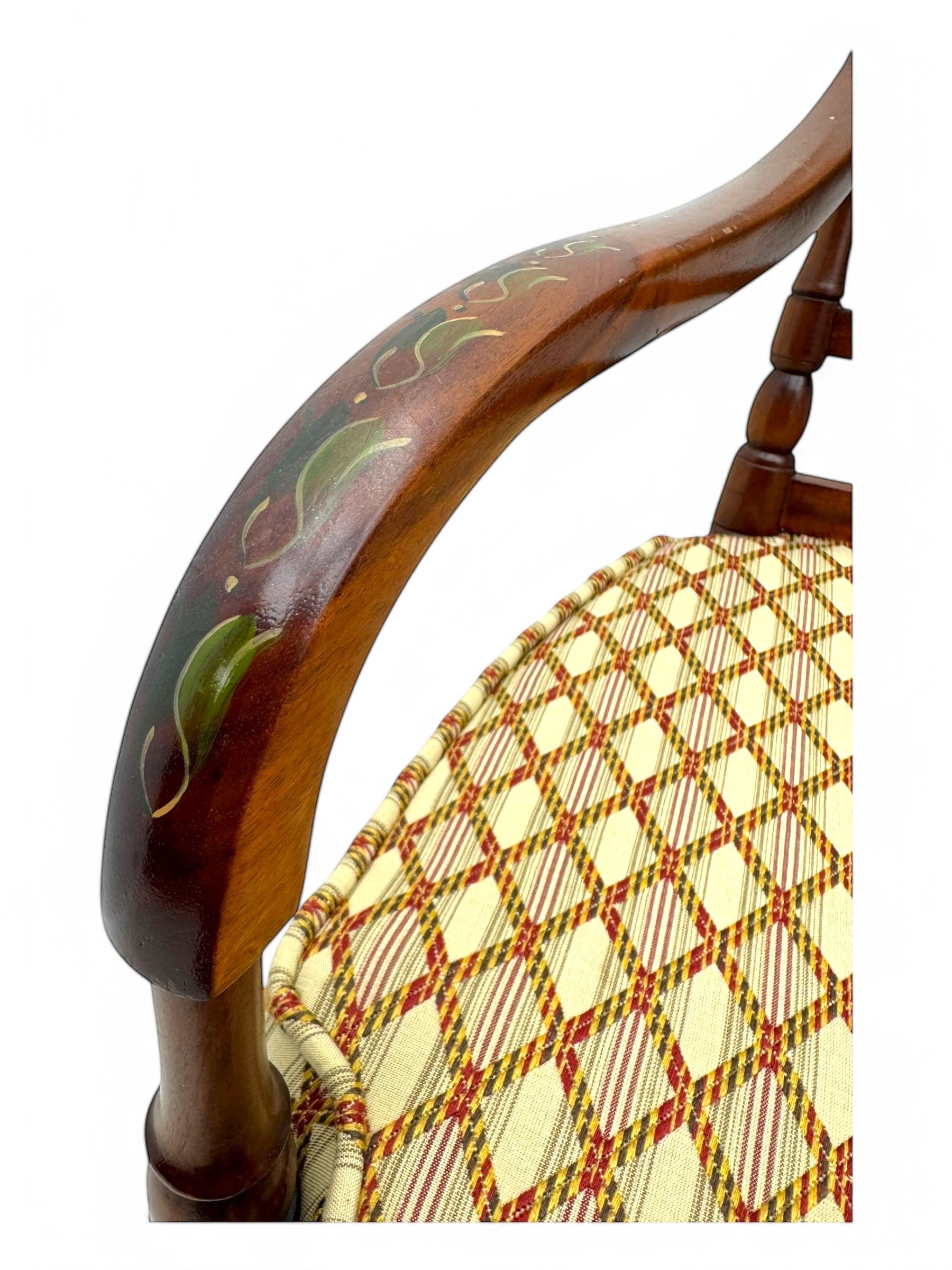 Edwardian Sheraton Revival inlaid mahogany parlour suite, comprising a two-seater settee and two matching armchairs, each with fan-shaped caned back, shaped crest rail with foliate inlay, scrolled open arms, upholstered seat with repeating geometric pattern, on turned and tapered front supports