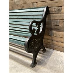 Early 20th century slatted garden bench with scrolling cast iron bench ends