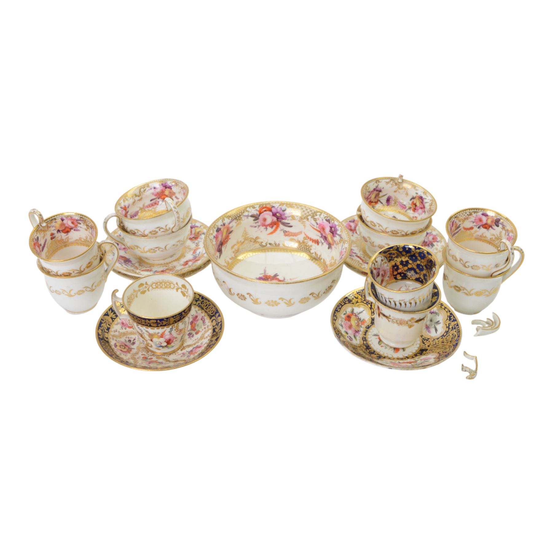 Coalport teawares, circa 1820-1840, comprising set of four trios, coffee cups, teacups and saucers, and slop bowl, decorated in the 830 pattern, with floral sprays and gilt shaped reserves, two further coffee cups and saucers, decorated with floral sprays upon blue grounds/with blue borders, and a similar coffee cup