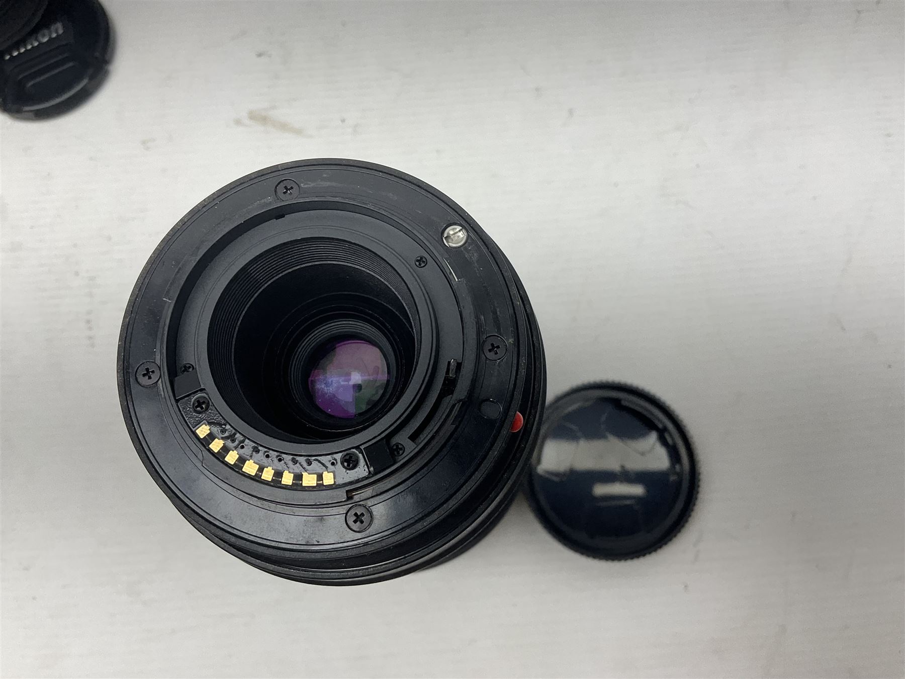 Nikon 'ED AF Micro Nikkor 200mm 1:4D' lens, Tamron 'SP Di AF 180mm 1;3.5 Macro1:1' lens, serial no 501075 and Tamron 'AF 70-300mm 1:4-5.6 Tele-Macro (1:2) ' lens, serial no 305906  