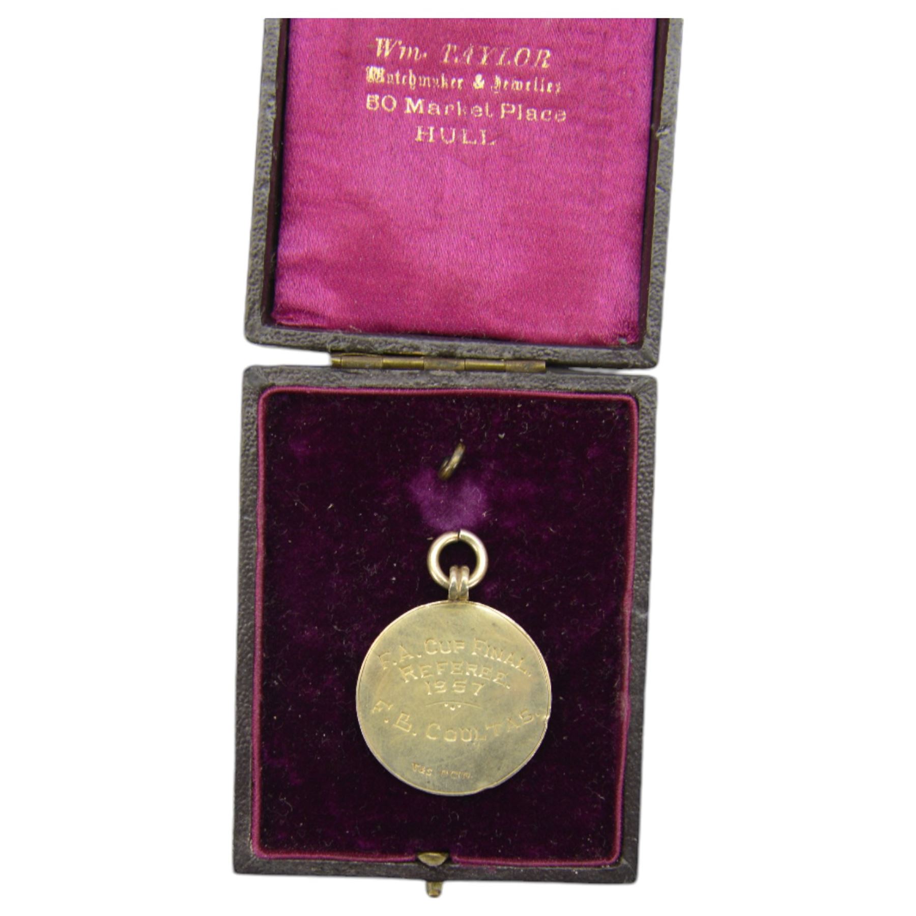 Collection of football memorabilia belonging and relating to the Hull based referee Frank Coultas, including 9ct gold Referee's medal for the 1957 Aston Villa v Manchester United FA Cup Final, inscribed 'The Football Association, F.B Coultas, F.A. Challenge Cup Competition, Final Tie 1957', hallmarked and in original case; the kit worn by him to referee the 1957 FA Cup Final and ephemera relating to the match including photographs, programmes and tickets; together with other football memorabilia collected by Frank Coultas, including programmes, photograph and ticket stubs, with some items relating to the 'Busby Babes'