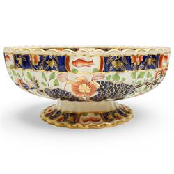 Large Victorian Copeland pedestal bowl decorated with Japanese flowers and birds, impressed mark D35cm and a Copeland two handled oval shallow dish with panels of Japanese flowers within a gilded scalloped rim, naturalistic handles and supports W30cm (2)