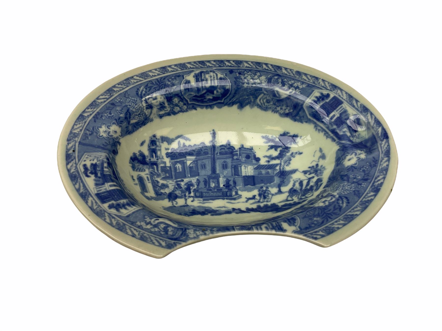 19th century Staffordshire pottery jug, entitled Willie Brewd a Peck o maut, depicting figures in relief, H24cm, a blue and white Victoria Ware Ironstone shaving bowl, L27.5cm, and a 19th century French Sarranguimes tankard with black transfer printed band depicting figures and horses, H17cm
