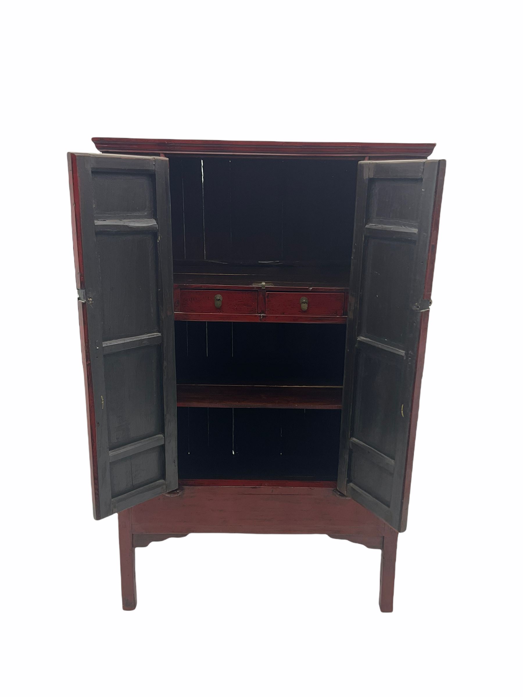  Chinese red lacquered elm and pine Moon marrige cabinet, enclosed by two doors, brass metalwork and hinges