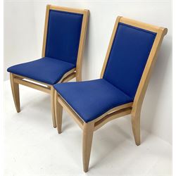 Set twenty beech framed banquet chairs upholstered in a blue fabric, shaped seat, square tapering supports