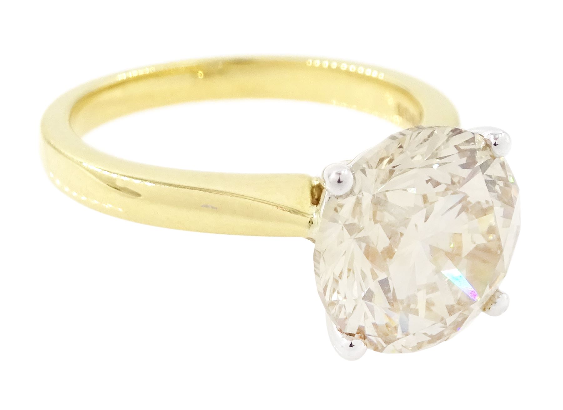 18ct gold diamond single stone ring, four claw set with a light brown diamond of approx 4.05 carat, London 2022