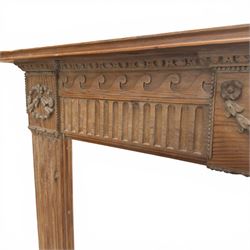 19th century Adams design pine fire surround, egg-and-dart carving over Vitruvian scrolls and fluted frieze, decorated with applied carved festoons and garlands, on fluted uprights