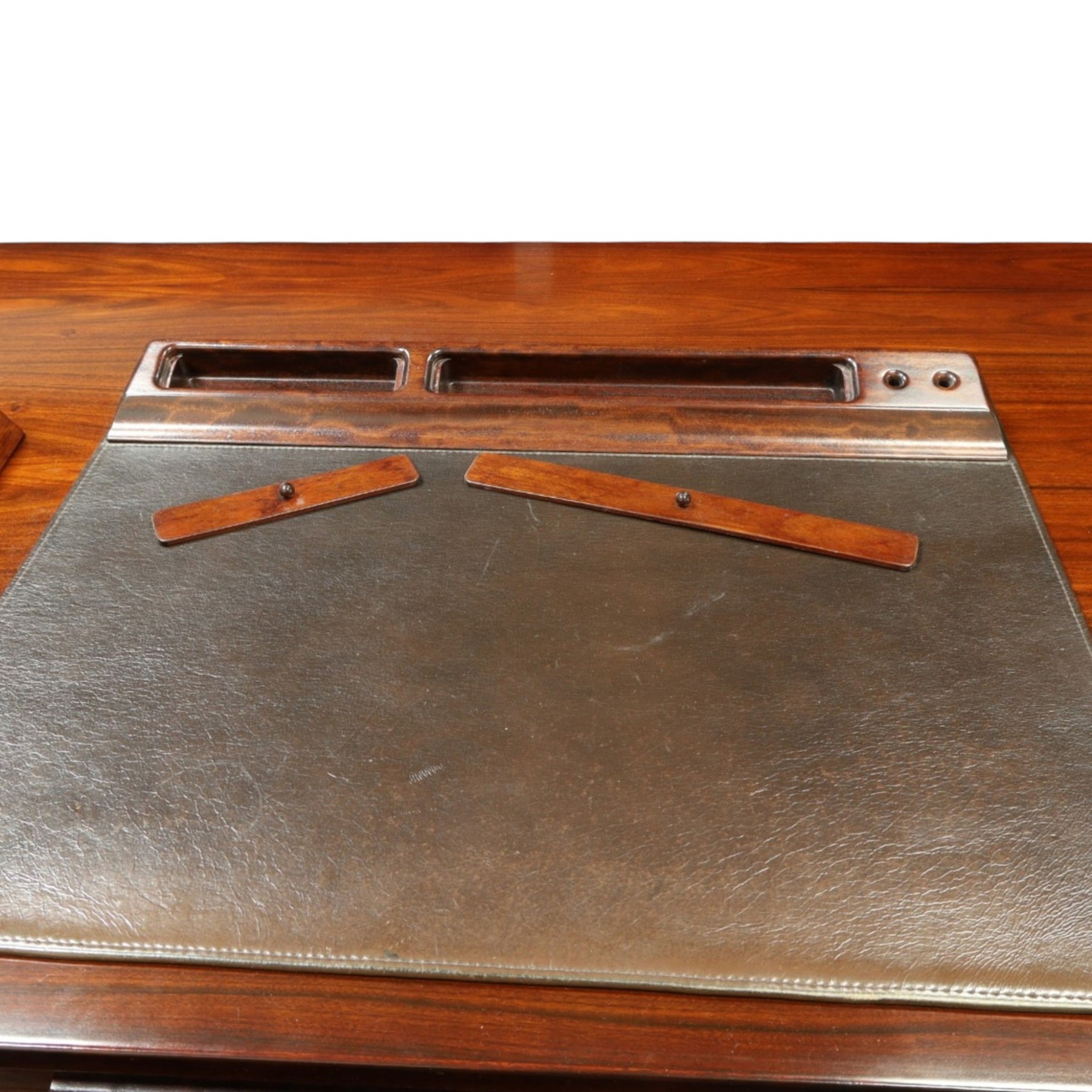 Dyrlund - Santos rosewood office suite, comprising an executive desk and cream leather upholstered swivel chair, the desk with a broad rectangular top with rounded corners, leather writing surface, pen compartments and letter tray, three lockable frieze drawers with fitted interiors above a central kneehole flanked by floating drawer pedestals, the left housing a filing drawer and the right three compartmented drawers, with a full width modesty panel to the reverse, chair raised on a castor base, H 116cm, W 62cm, D 74cm