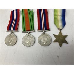 Eight WW2 medals comprising two War Medals 1939-1945, two Defence Medals, Atlantic Star, Italy Star, Pacific Star and 1939-1945 Star; all with ribbons (8) 