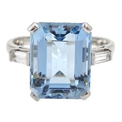 18ct white gold emerald cut aquamarine ring, the aquamarine measuring approx 13mm x 10.3mm x depth of approx 6mm, with baguette diamond shoulders, hallmarked