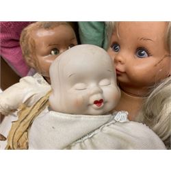 Quantity of vintage and later dolls to include unusual three faced example and further dolls marked C.J, Gloobee, Rosebud etc in three boxes