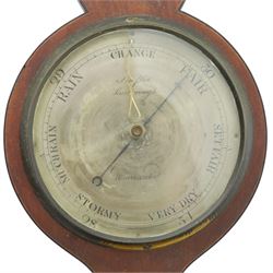 Three mahogany wheel barometers, each with silvered dial, thermometer and hygrometer, two with inlaid decoration, one with architectural pediment and one with swan-neck pediment 