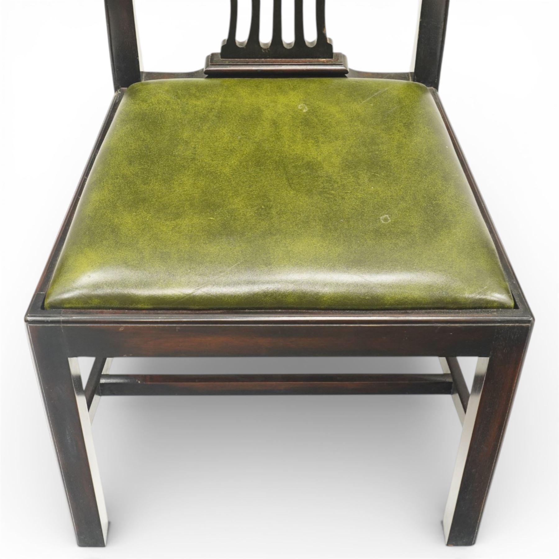 Set of eight Georgian style mahogany dining chairs, comprising six chairs and two carvers, the shaped top rails above pierced vase splats, and green leather upholstered drop in seats, upon square legs united by stretchers