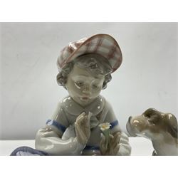 Lladro figures, comprising 'I Hope She Does', model no 5450, 'New Friend' model no 6211, 'It Wasn't Me' model no 7672 and 'A Friend for Life' model no 7685, all with boxes