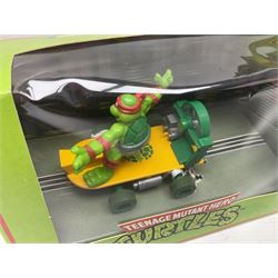 Scalextric - eight Hornby Teenage Mutant Ninja Turtles slot cars, nos.C130, C131, C132, C134, C338, C339, C421 & C422; and two further Scalextric slot cars, C465 Batmobile and C139 Parmalat Brabham; all boxed (10)