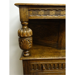  Early 20th century oak court cupboard, moulded top, cup and cover carved supports, two drawers above two cupboard doors, stile supports, W153cm, H145cm, D52cm  