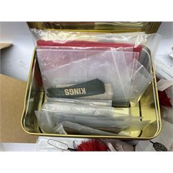 Quantity of military horse hair plumes and feather hackles, cloth stripes and regimental titles etc