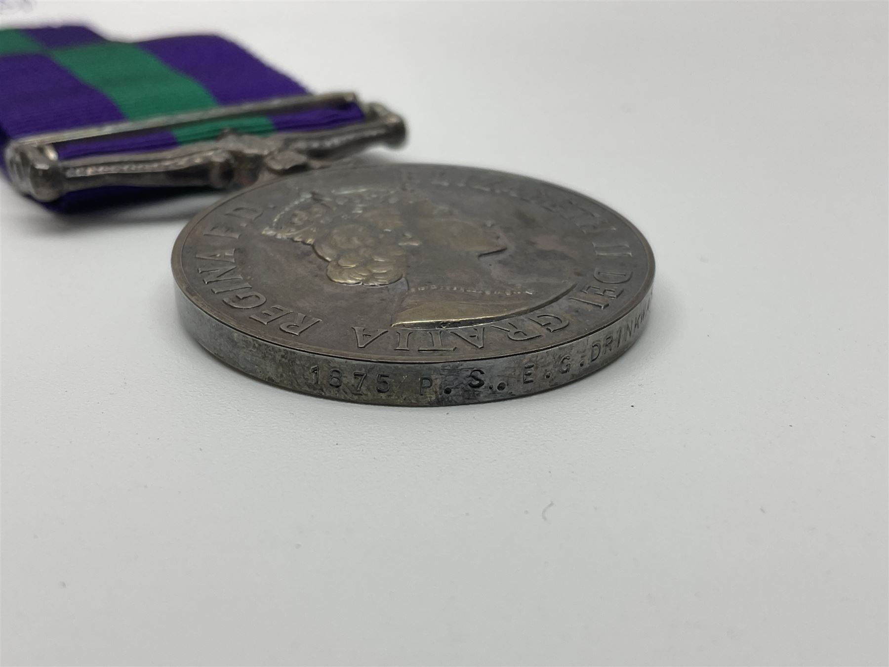 Collection of WW2 and police medals c.1933-1955, awarded to Eric Drinkwater comprising 1939-45 War Medal, Defence Medal, 1939-45 Star and Burma Star, on wearing bar; 1918-62 General Service Medal with Cyprus clasp to P.S. E.G. Drinkwater; boxed; Police Long Service and Good Conduct Medal to Const. Eric C. Drinkwater; cased; Royal Life Saving Society bronze medal to E.C. Drinkwater July 1933; boxed; and George V 1937 coronation medallion; boxed.