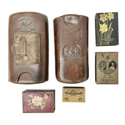 Victorian leather cigar protector with metal match striking plate on the end and internal spring to hold the cigars in place; expands for differing lengths of cigar, minimum L12.5cm; another similar leather cigar case marked Middlemore's Patent with attached vesta case and striker; three Bryant & Mays tin-late matchbox holders including 1935 Jubilee; and small box of matches (6)