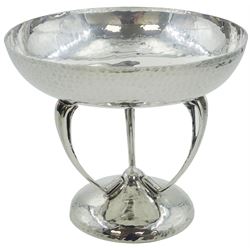 Early 20th century Arts & Crafts silver tazza, the circular planished bowl supported by three curved supports upon a circular spreading planished base, hallmarked Mappin & Webb Ltd, London 1908, H12cm D15cm, approximate weight 9.64 ozt (300 grams)