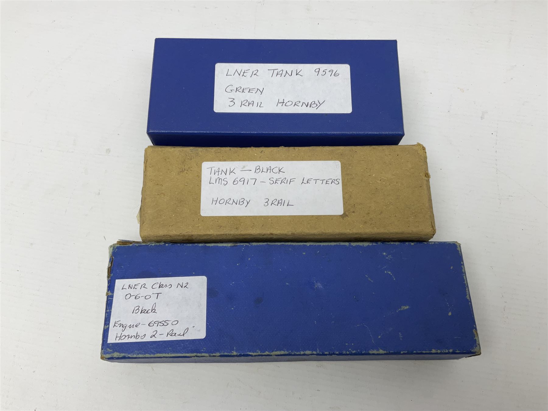 Hornby Dublo - 3-rail - Class N2 0-6-2 locomotive No.9596 in LNER green; and Class N2  0-6-2 tank locomotive No.6917 in LMS black with serif letters; together with a 2-rail Class N2 0-6-2 tank locomotive No.69550; each in unassociated box (3)