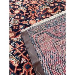 North West Persian Mahal indigo ground runner rug, the field decorated with all-over crimson Herati motifs, the guarded border with trailing geometric designs
