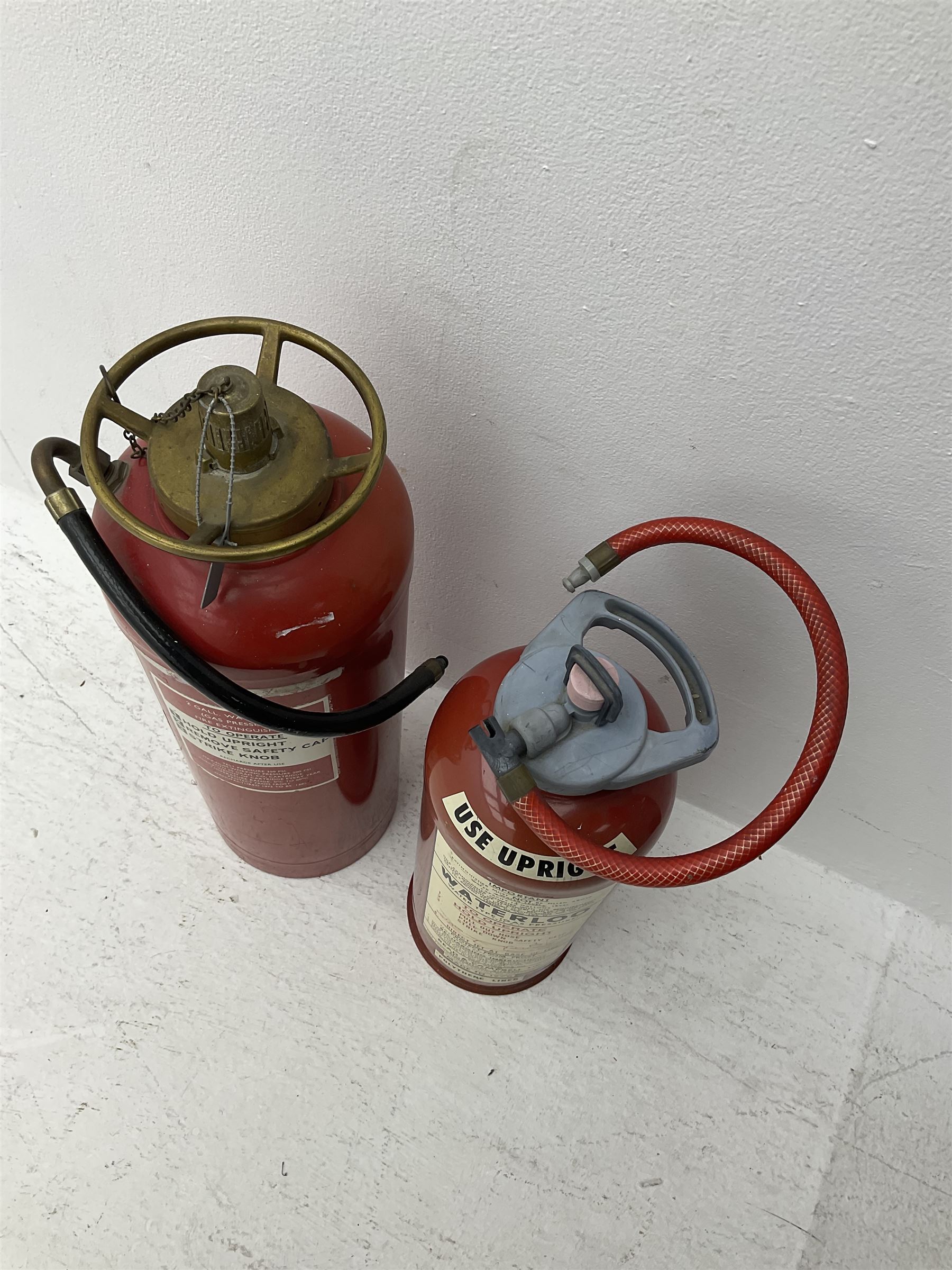 Waterloo fire extinguisher dated 1970, Read & Campbell Ltd, together with another fire extinguisher dated 1970, tallest H59cm