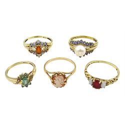 Five 9ct gold stone set rings including pearl and tanzanite, two opal and fire opal clusters and cameo, all hallmarked or stamped