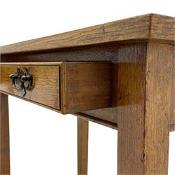 Matched pair of late 19th century side tables in walnut and oak, rectangular leather inset top over single moulded door, on square tapering supports with splayed feet, one table in walnut and the other in oak