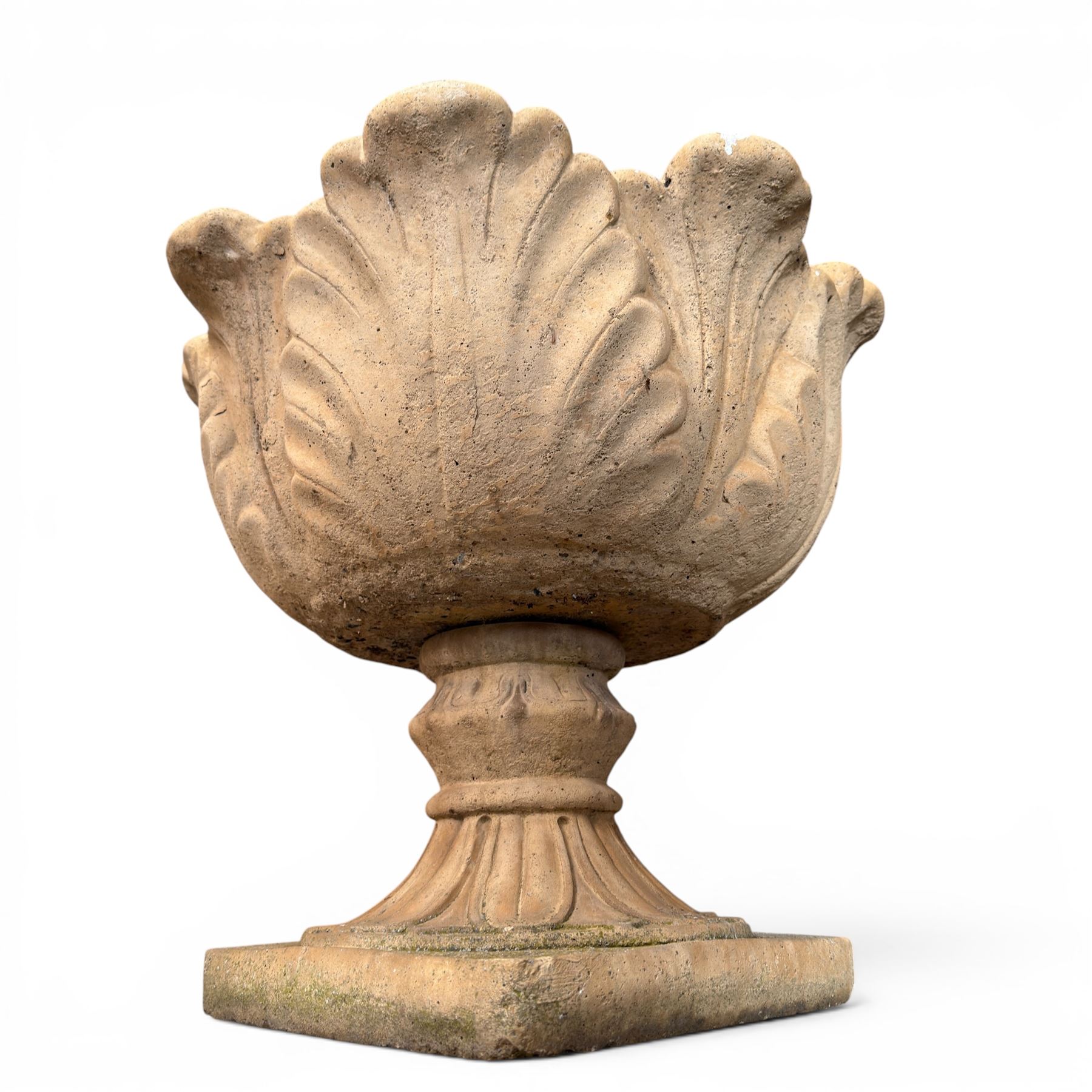 Cast stone five sectional urn on plinth, squat leaf and petal design urn on square base