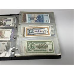 World and Great British banknotes to include Brazil, Canada, France, Germany, Ghana, Indonesia, Iraq, Hong Kong, Hungary, Japan, Vietnam, Zimbabwe, a collection of Chinese ‘Hell Money’, and quantity of ‘De La Rue Systems’ test notes, housed in ring binder and loose