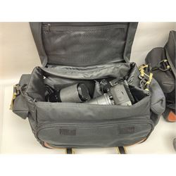 Four camera bodies, to include, Ricoh KR-10 serial no. 38826, Pentax MZ-M serial no. 4185969 with 'SMC Pentax- M 1:3.5 28mm' lens, Canon EOS500 serial no. 080927, with 'Sigma Zoom 100-300mm 1:4.5-6.7 DL'  lens etc, with other camera lenses and equipment 