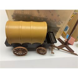 Collection of Playmobile Cowboys and Indians plastic figures, teepees, covered wagon etc