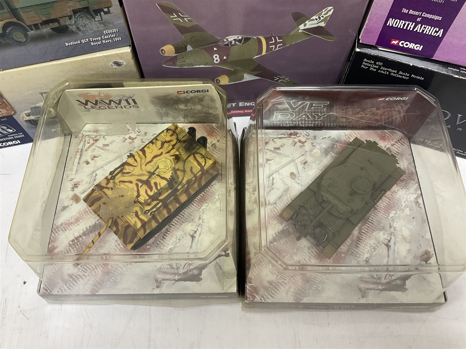 Ten Corgi Military models - Aviation Archive AA35706 Birth of the Jet Engine; WWII Legends CC60502 Tiger 1 Tank; VE Day CC60606 Cruiser Tank; four WWII Collection CC51707, CC60002, CC60301 & CC60105; WWII Allies Churchill Tank; WWII Adversaries Krauss-Maffei Semi-Track; and 07501 British Army Landrover & Trailer; all boxed (10)