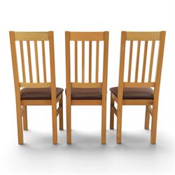 Modern solid oak dining table with set six chairs, chairs with brown leatherette seat
