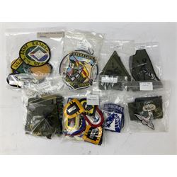 Mostly American cloth badges, including cavalry, airborne division, desert storm, special forces etc