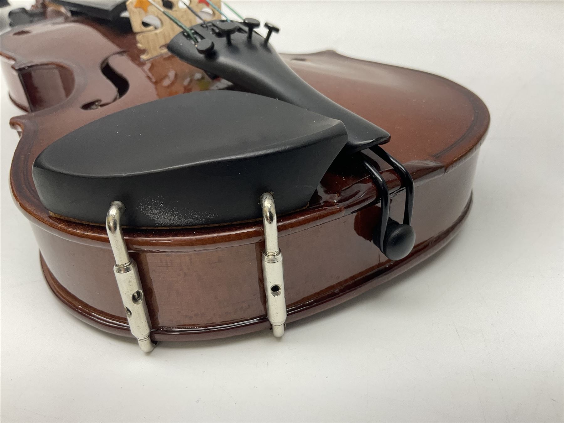 Four student violins - two Chinese three-quarter size with 33.5cm and 34cm two-piece backs; Stringers of Edinburgh quarter size with 28cm two-piece back; and Stentor quarter size with 28cm two-piece back; each in carrying case (4)