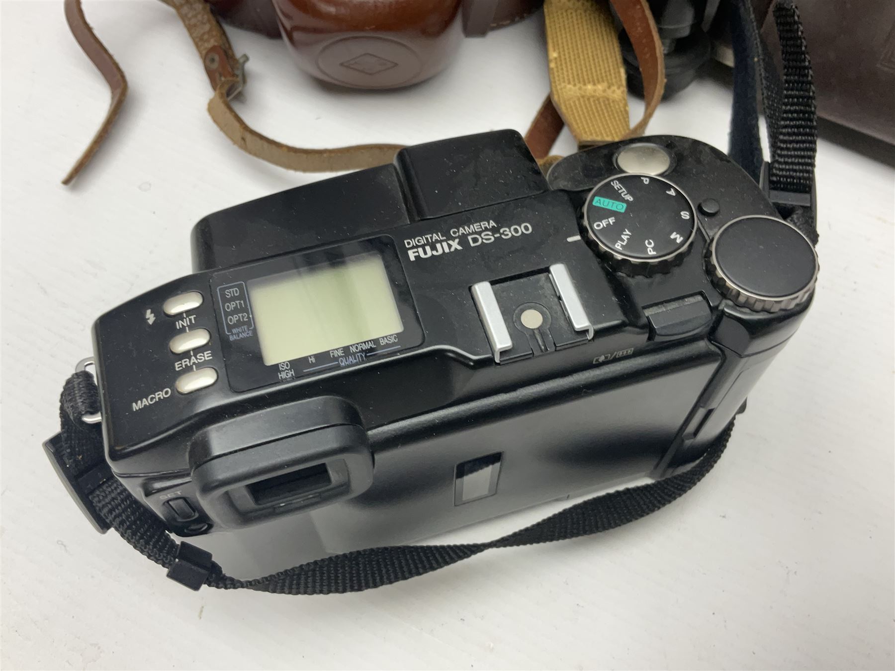 Collection of cameras and lenses, to include Pentax Program A camera body, serial no 123759, with 'Pentax-A zoom 1:3.5-4.5 28-80mm' len, Praktica EE2 camera body with 'Pentacon electric 1.8/50' lens etc, together with a Manfrotto tripod 