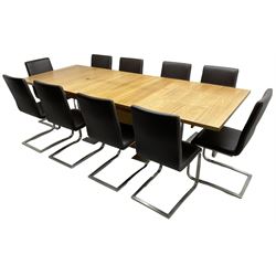 Contemporary walnut extending dining table, rectangular pull-out extending action top with two additional leaves, on rectangular base with burnished metal feet (160cm - 258cm x 100cm, H78cm); together with a set of ten cantilever dining chairs upholstered in stitched brown leather, on burnished metal supports 