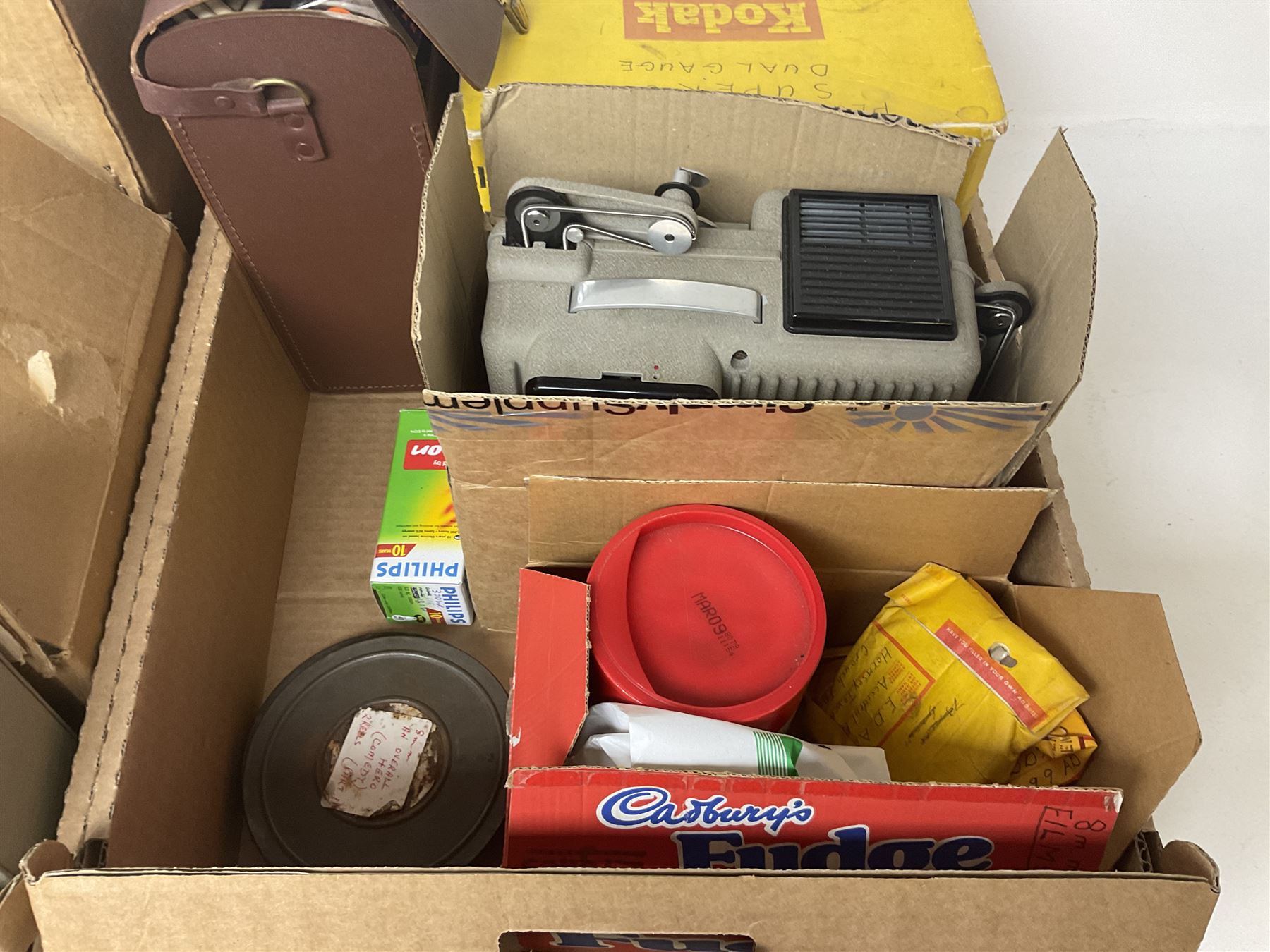 Large collection of projectors and equipment, to include Alphaxia Gnome projector, Kodak Brownie projector, slide containers, projector screen, etc, in six boxes