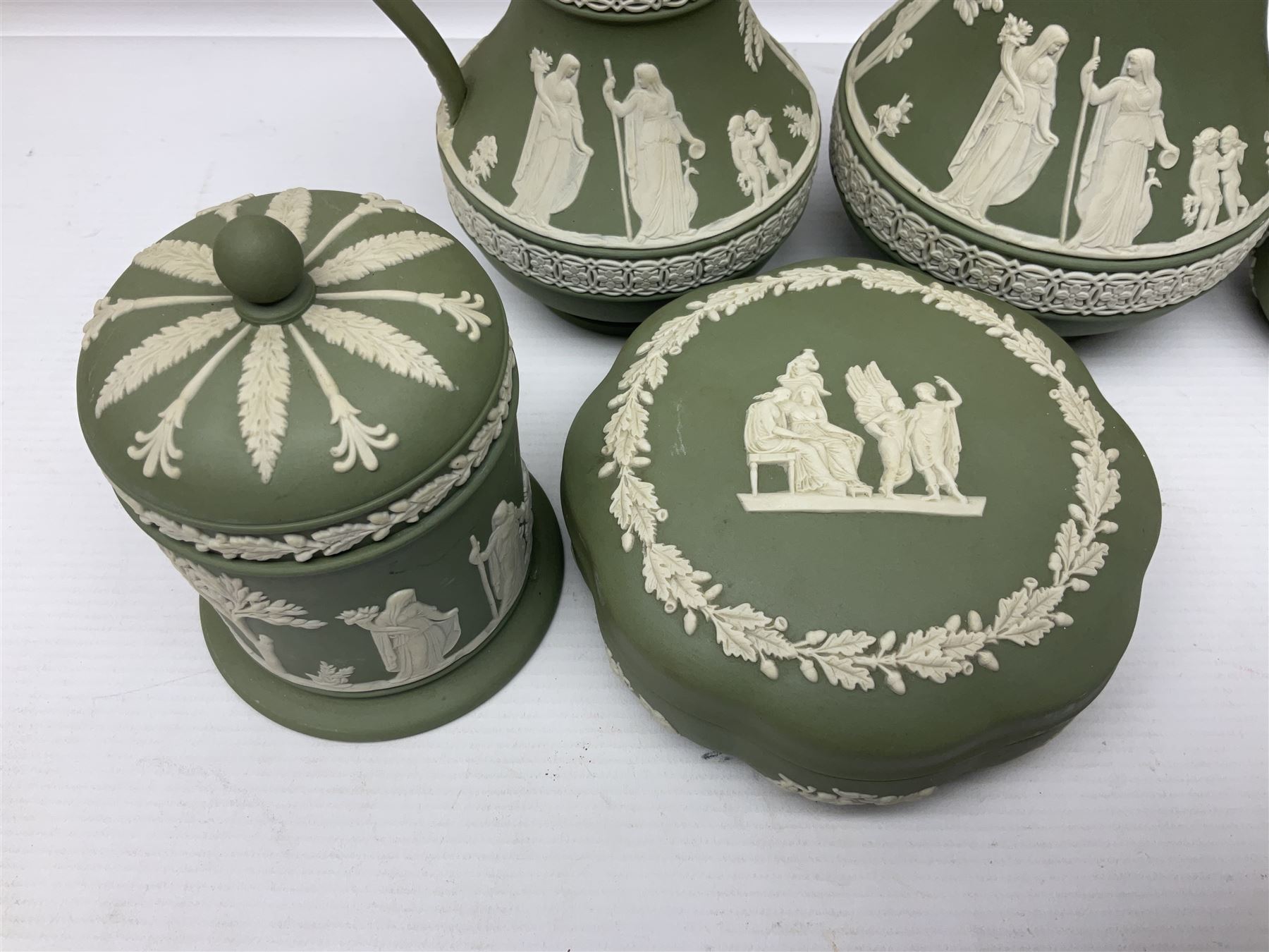 Collection of  Wedgwood green Jasperware, to include large jug, vases, trinket dishes, etc together with two teal Jasperware vases 