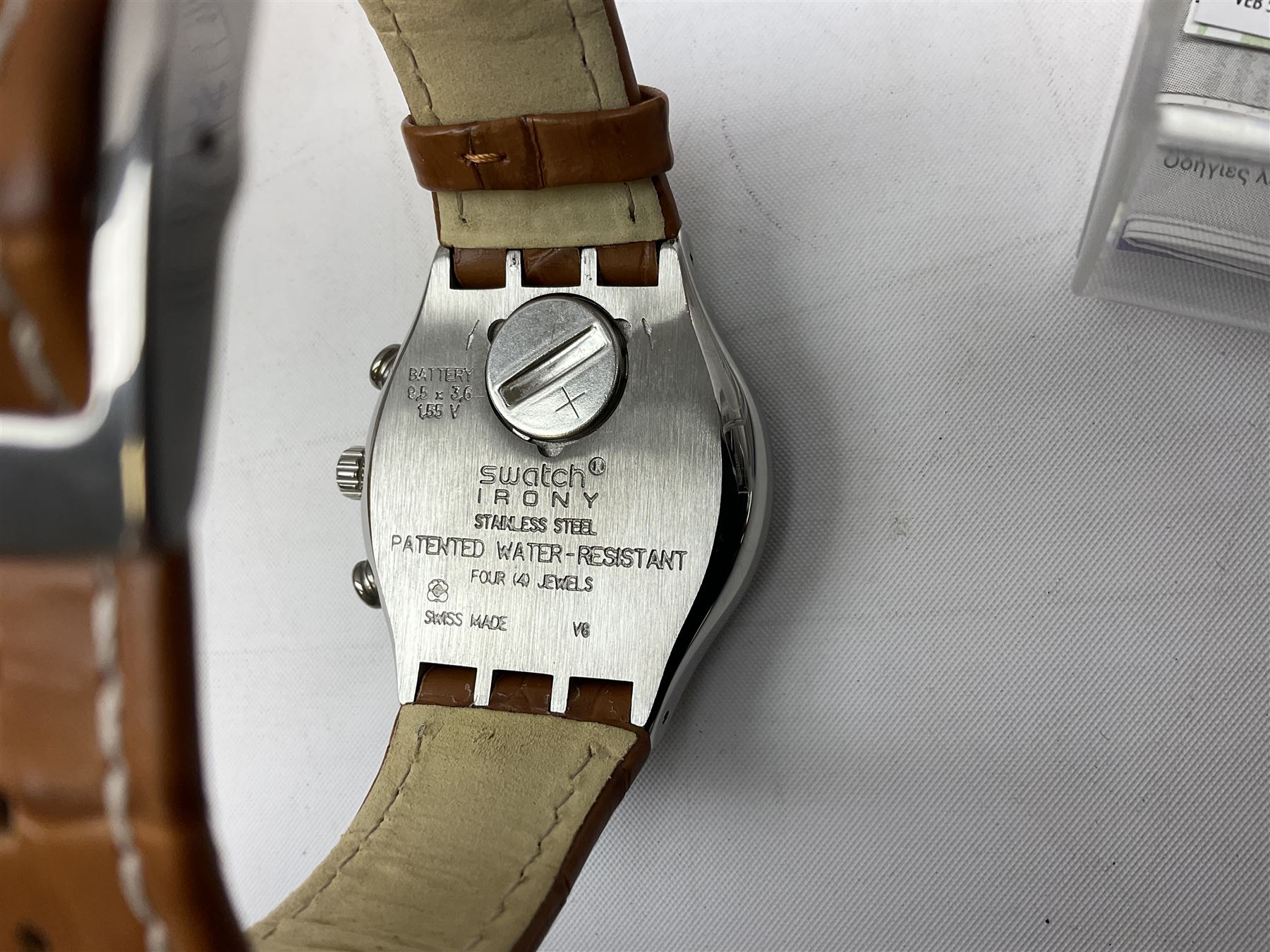 Swatch Irony chronograph stainless steel quartz wristwatch, on original tan leather strap and one other Irony quartz wristwatch, on stainless steel strap both boxed (2)