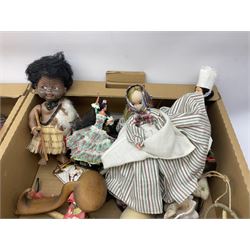 Large quantity of dolls to include oriental examples, native examples, knitted examples etc in four boxes